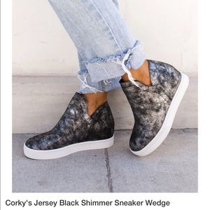 Corky’s black shimmer wedge sneakers